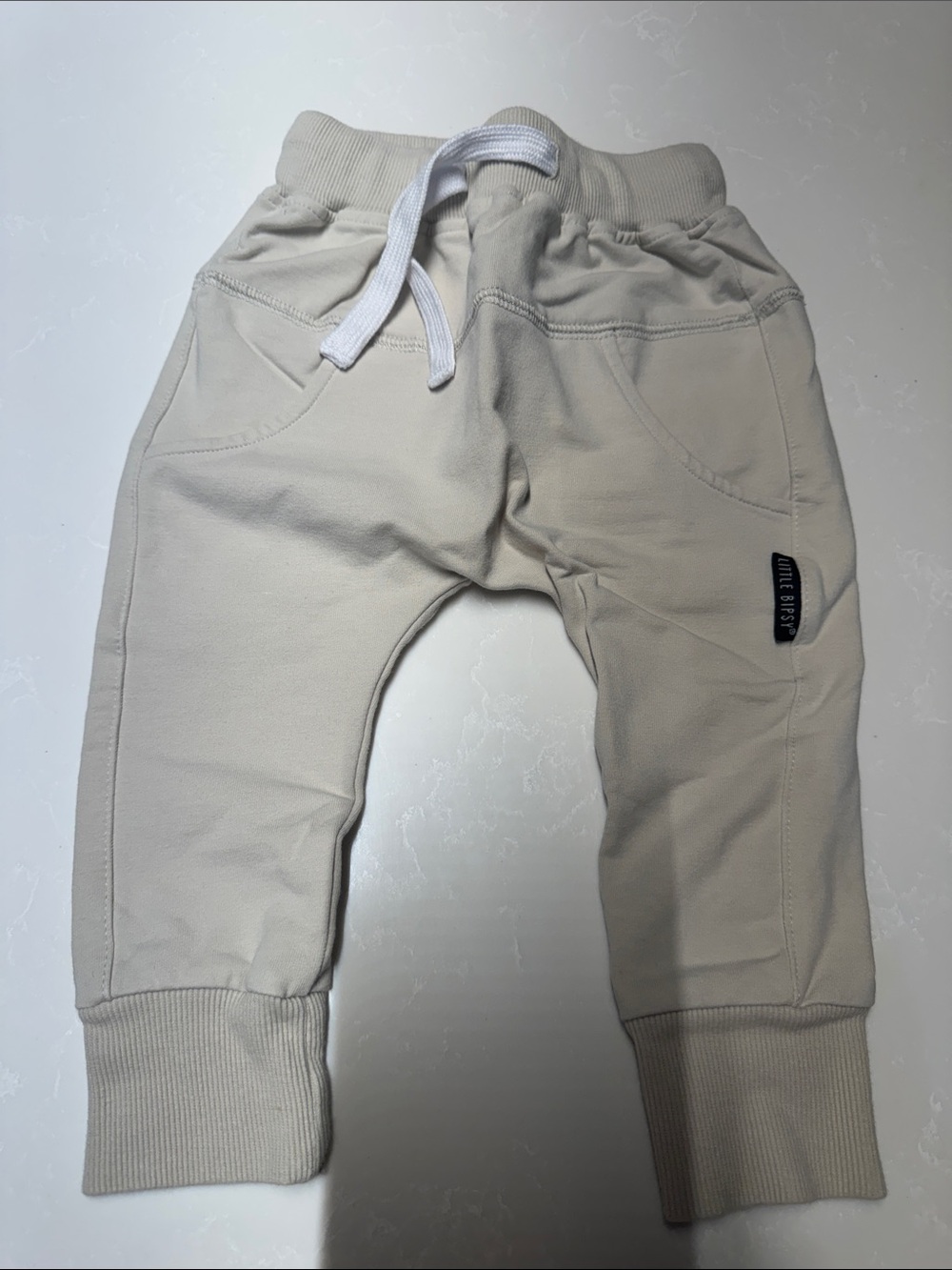 Little Bipsy Cream Jogger Pants with White Drawstring